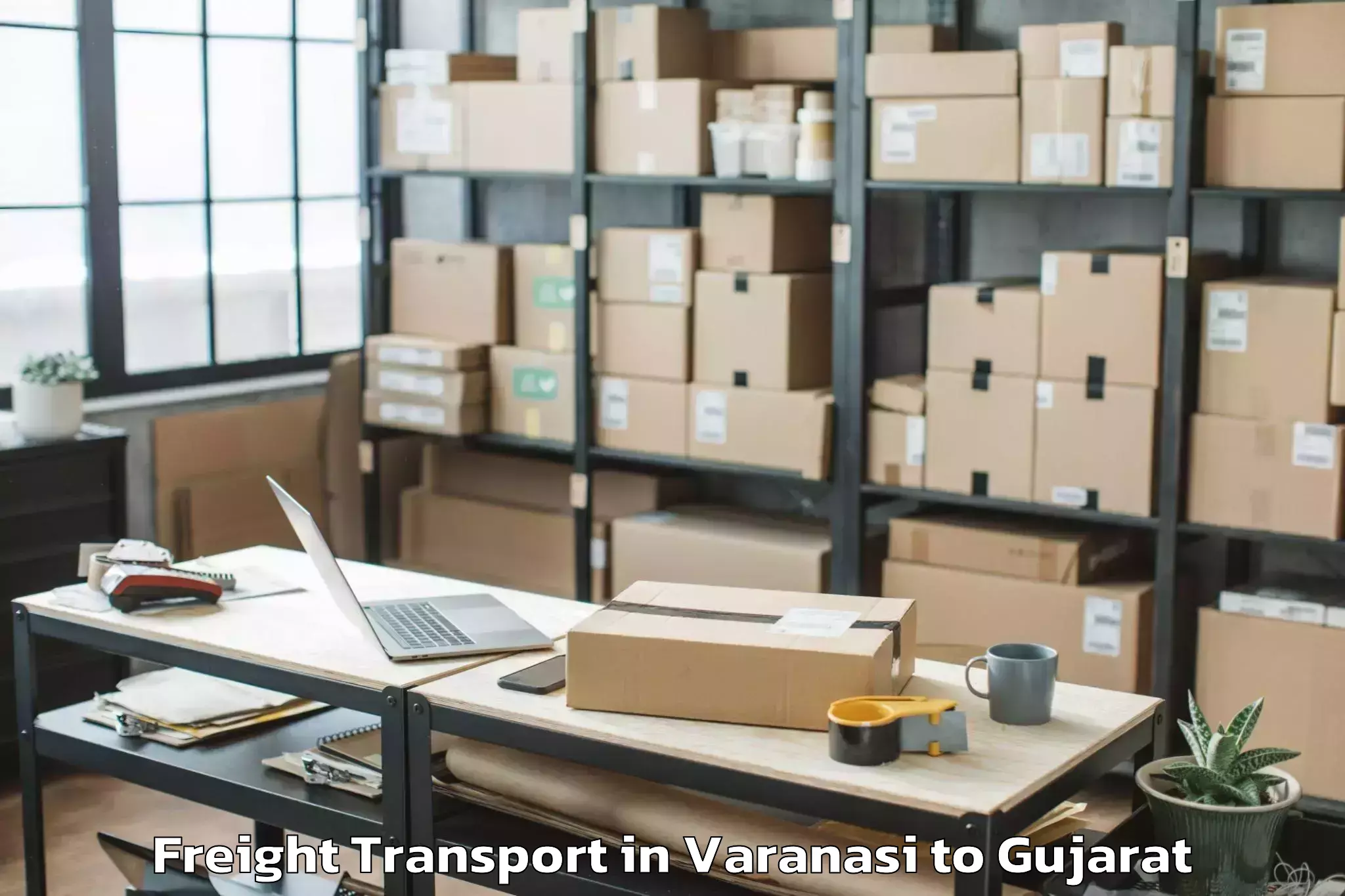 Book Varanasi to Vaghodia Ina Freight Transport Online